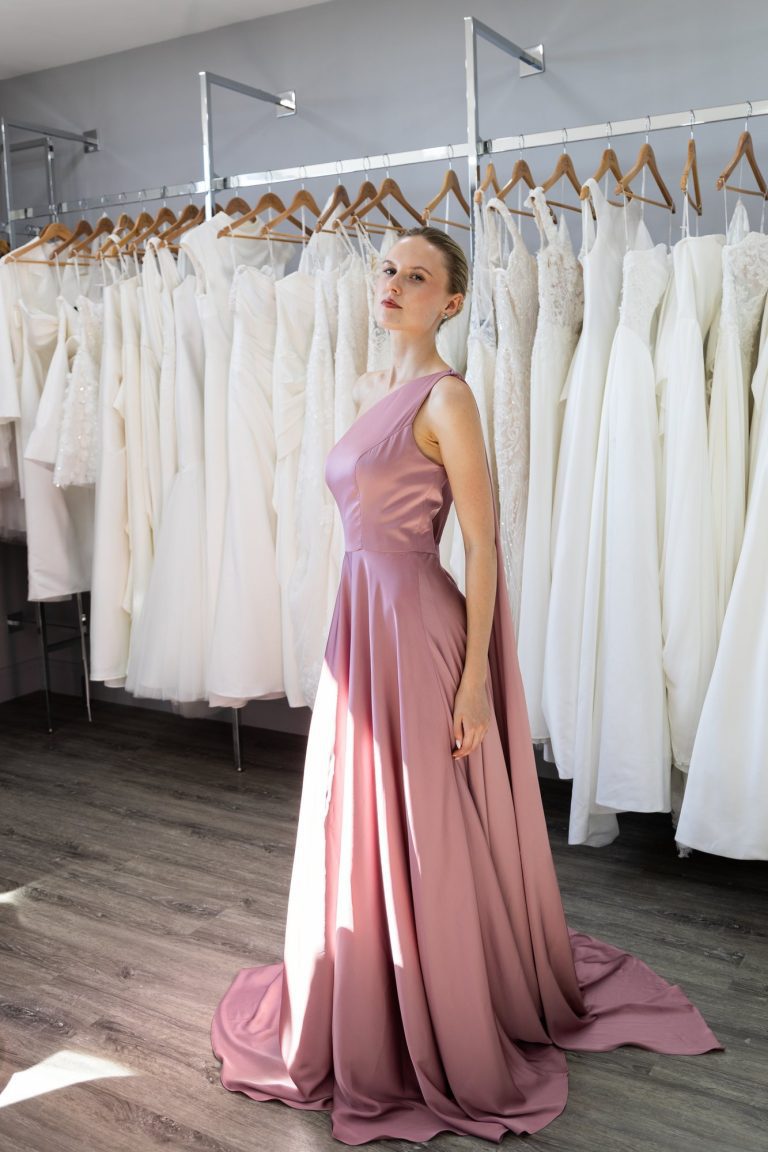 Woman in a dusky pink satin gown at VBB