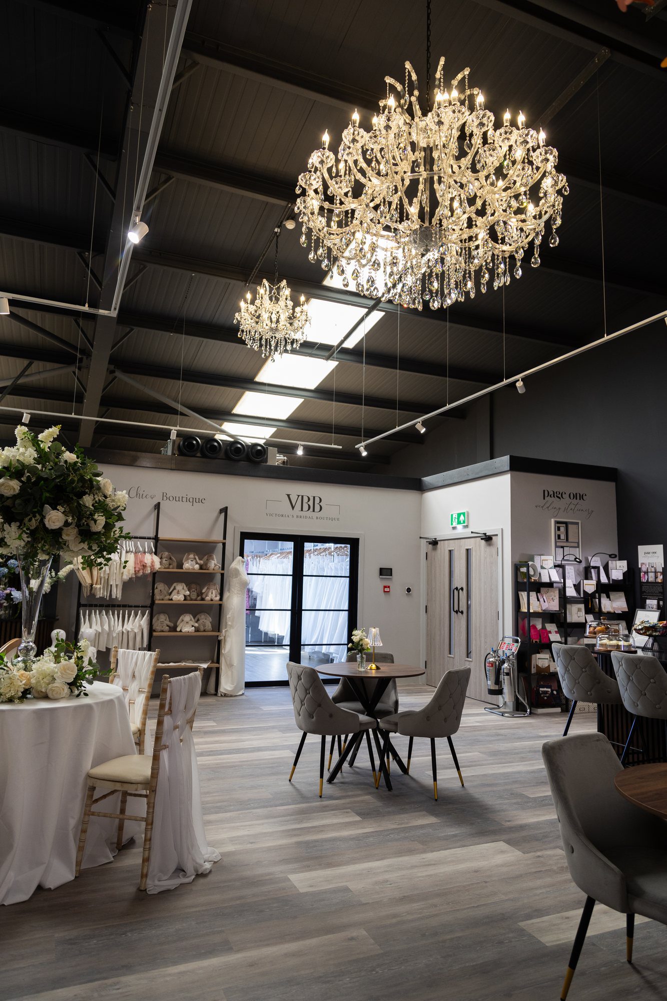 Chandeliers and seating inside The Wedding Showroom